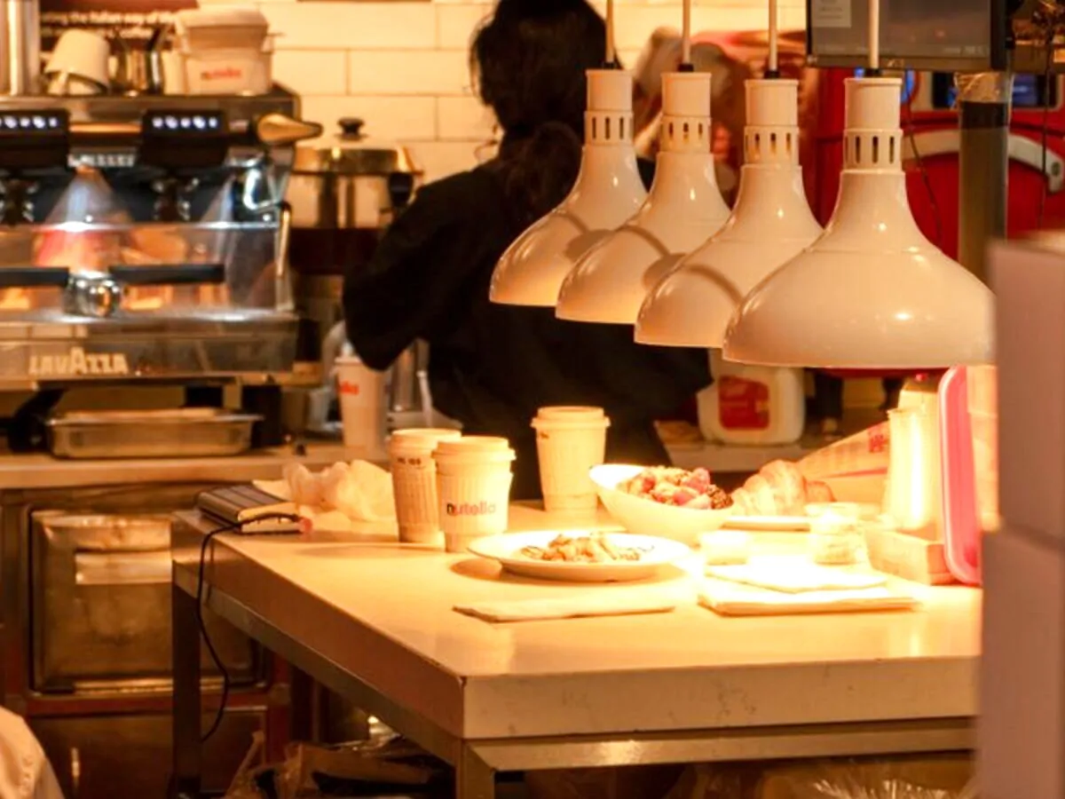Cafe service counter with coffee equipment